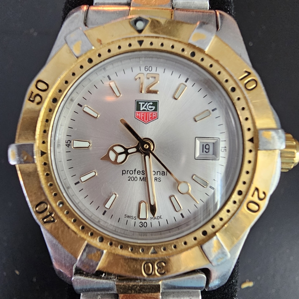 Tag Heuer Professional 200 meter white face watch with Gold bezel  2 tone band